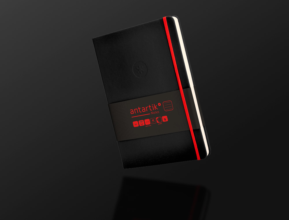 CUADERNO CON GOMILLA ANTARTIK NOTES TAPA DURA A5 HOJAS RAYAS NEGRO Y ROJO 100 HOJAS 80 GR FSC